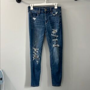 American Eagle Distressed Super Stretch X Skinny Jeans Medium Wash Size 4